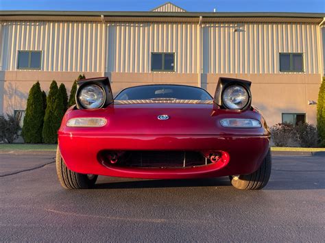 Is a Mazda Miata a Sports Car? And Can It Outrun a Snail on a Treadmill?